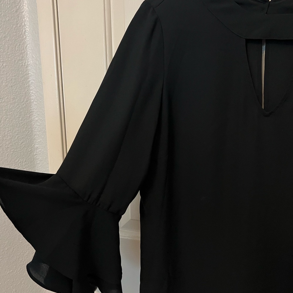 Black ruffle sleeve top